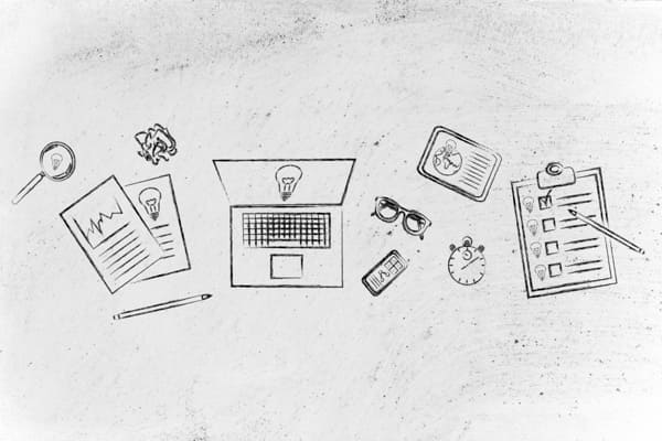Drawing of a laptop, a cell phone, notebooks on a desk.